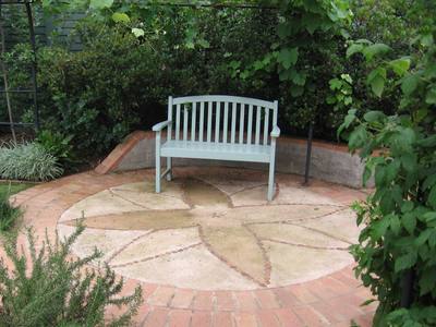 Garden design by Shirley Wallington — Blue painted bench
