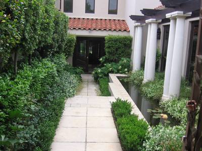 Garden design by Shirley Wallington — Formal front entrance with pondrnley