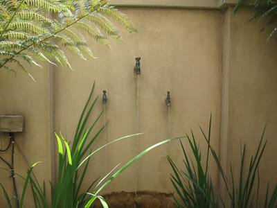 Garden design by Shirley Wallington — Taps are fun to use as water spouts
